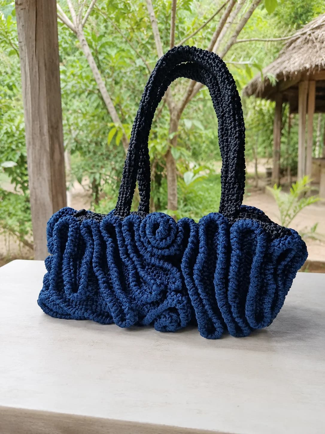 Élan Wave handmade luxury crochet handbag.